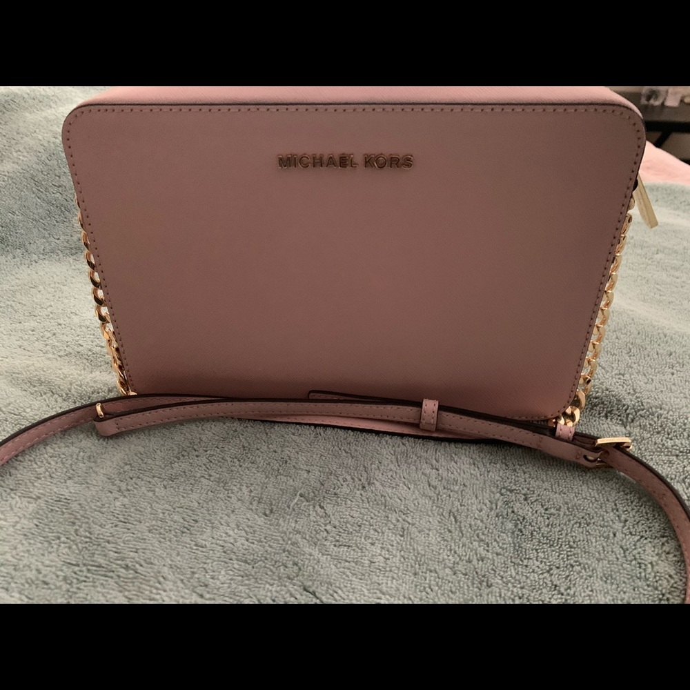 Michael Kors pink crossover handbag and wallet